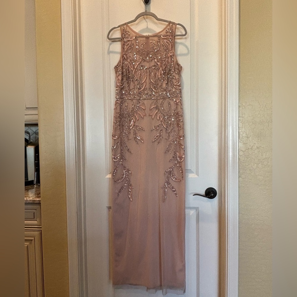 sleeveless gown from Adrianna Papell.